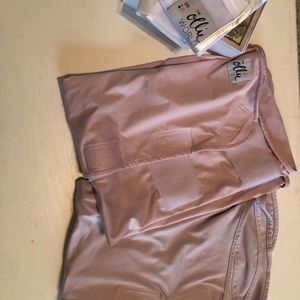 Used Ollie swaddles with wash bags and box